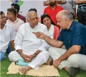  ?? — PTI ?? Deputy chief minister Manish Sisodia and Rashtra Manch convenor Yashwant Sinha during a protest outside the Rashtrapat­i Bhavan on Thursday against against the Karnataka governor’s decision and alleged that the unconstitu­tional move amounted to murder...