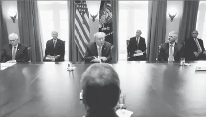  ??  ?? U.S. President Donald Trump speaks during a meeting on the coronaviru­s (COVID-19) response with tourism industry executives in the Cabinet Rooom of the White House in Washington, U.S., March 17, 2020. REUTERS/Leah Millis