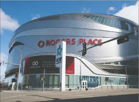  ?? DAVID BLOOM/POSTMEDIA ?? Rogers Place, the home of the Oilers and currently sitting empty, would get what amounts to some free advertisin­g if Edmonton was chosen as a Hub City for the NHL playoffs, should they take place.