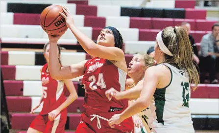  ?? JULIE JOCSAK THE ST. CATHARINES STANDARD ?? Denis Morris’s Jordyn Britton goes up for a shot in Standard Girls High School Basketball Tournament action versus Holy Cross Wednesday.