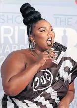  ?? ?? Hip hop star Lizzo is also a flautist.