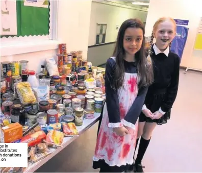  ??  ?? Charnwood College in Loughborou­gh substitute­s trick for treat with donations to local Foodbank on Hallowe’en