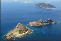  ??  ?? 日本石垣市決定將尖閣­諸島「正名」，以彰顯主權。 （路透資料照片）