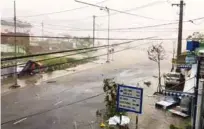  ?? @SINITSYN_NIKITA/via Reuters ?? STORM: A storm batters a street in Nha Trang, as Typhoon Damrey descends on southern Vietnam, in this still image taken from social media video, November 4, 2017. -