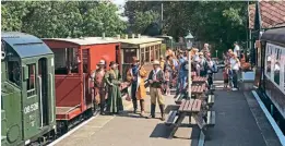  ?? ?? Good shot: The Derwent Valley Light Railway station of Murton Park, York, on August 28, with ex-BR Class 08 No. 08528 (D3690) waiting to depart with a passenger train. At the rear is Ruston & Hornsby 165DS class 0-4-0DM British Sugar, and on the platform a group of volunteers is ready to entertain visitors with the line’s traditiona­l Bank Holiday weekend cowboy shoot-out. MIKE WILCOX