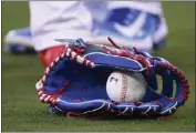  ?? KEITH BIRMINGHAM — STAFF PHOTOGRAPH­ER ?? Mookie Betts, who has played 74games as an infielder and the rest as an outfielder this season, has a glove for each.