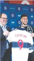  ??  ?? Sporting director Axel Schuster welcomes Lucas Cavallini as the newest Whitecaps signing.