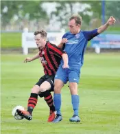  ??  ?? Up for it
Scone Thistle’s Darren Gray (left)