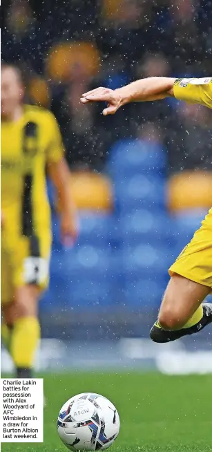  ?? ?? Charlie Lakin battles for possession with Alex Woodyard of AFC Wimbledon in a draw for Burton Albion last weekend.