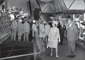  ??  ?? Queen Elizabeth II, left, and then Ontario premier John Robarts tour the Ontario Pavilion at Expo 67, on July 3, 1967.