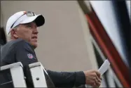  ?? DAVID ZALUBOWSKI ?? Denver Broncos general manager John Elway looks on during an NFL football training camp with the Broncos and San Francisco 49ers Friday, Aug. 16, 2019, in Englewood, Colo.