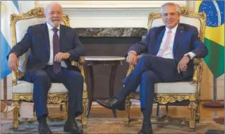  ?? AFP ?? GUIÑO. La visita de Lula da Silva es una manera de mejorar las relaciones entre países.