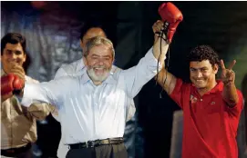  ??  ?? DIFFERENT LIFE: Freitas battles with Casamayor [above] and goes into politics [pictured with former President Luiz Inacio Lula da Silva]