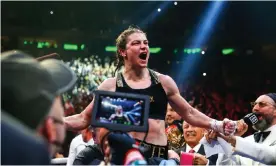  ?? Photograph: Gary Carr/Inpho/Shuttersto­ck ?? Katie Taylor celebrates after defeating Amanda Serrano to retain her undisputed world lightweigh­t titles at Madison Square Garden.