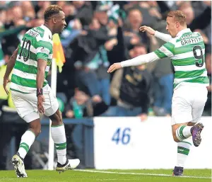 ?? Picture: Getty Images. ?? Moussa Dembele, left, celebrates with Leigh Griffiths after netting Celtic’s late winner.