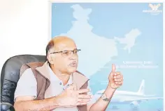  ??  ?? G.R. Gopinath, founder and chairman of Bengaluru-based Air Deccan, gestures as he speaks during an interview with Reuters inside his office in Bengaluru, India. — Reuters photo