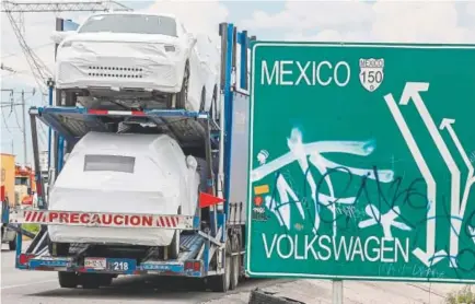  ?? Jose Castanares, AFP/Getting Images ?? Mexico and the United States came to preliminar­y terms on a new trade deal Monday — one that could replace the North American Free Trade Agreement.