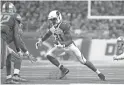  ?? TIM FULLER/USA TODAY SPORTS ?? Cardinals running back David Johnson (31) carries the ball during the third quarter against the Detroit Lions on Sunday at Ford Field in Detroit.