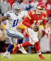  ?? Jamie Squire / Getty Images ?? Kansas City’s Patrick Mahomes races away from Dallas’ Micah Parsons in the Chiefs’ 19-9 home win. Mahomes was 23 of 37 for 260 yards while leading Kansas City to its third straight victory.