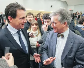  ?? JOHN MAHONEY FILES ?? Daniel Turp, now IRAI chairman, speaks with founder and donor Pierre Karl Péladeau in 2014. Péladeau had created the institute as part of his Parti Québécois leadership campaign.