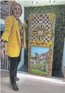  ??  ?? COOL FACTOR: Margaret Hirsch, executive director of the Hirsch’s Homestore Group, with the Smeg FAB28 Frigorifer­o D’Arte currently selling for R1.3m