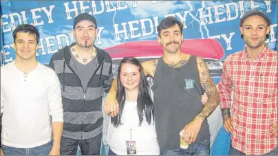  ?? SUBMITTED PHOTO/MACKENZIE GALLANT ?? MacKenzie Gallant, middle, with members of Hedley at a concert meet and greet.