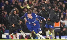  ?? Photograph: Bradley Collyer/PA ?? Cole Palmer (centre) sends Chelsea’s subsitutes and fans into delirium after sinking sorry Manchester United with his very own Chelsea late show.