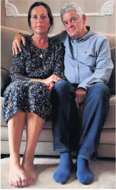  ??  ?? ‘We feel hollow’: Ceri and John Channon, Tom’s parents, at home