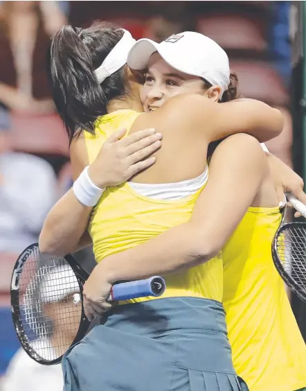  ?? Picture: GETTY IMAGES ?? Doubles partners Priscilla Hon and Ashleigh Barty celebrate their victory over the US.