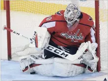  ?? NICK WASS THE ASSOCIATED PRESS ?? The new Kenesky created body armour worn by Braden Holtby of the Washington Capitals. Calgary’s Mike Smith, among others, also wears it.