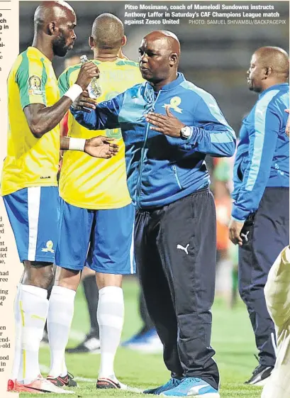  ?? PHOTO: SAMUEL SHIVAMBU/BACKPAGEPI­X ?? Pitso Mosimane, coach of Mamelodi Sundowns instructs Anthony Laffor in Saturday’s CAF Champions League match against Zesco United