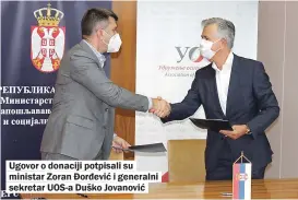  ??  ?? Ugovor o donaciji potpisali su ministar Zoran Đorđević i generalni sekretar UOS-A Duško Jovanović