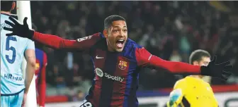  ?? AP ?? Barcelona's Vitor Roque celebrates after scoring against Osasuna during a Spanish La Liga soccer match at the Estadi Olimpic Lluis Companys stadium in Barcelona, Spain, on Wednesday.