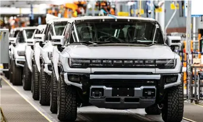  ?? Photograph: Dominick Sokotoff/Rex/Shuttersto­ck ?? Joe Biden has sought to throw his weight behind electric cars, recently taking the new electric Hummer for a test drive at a GM plant in Michigan and declaring it ‘one hell of a vehicle’.