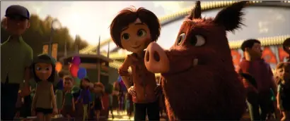  ??  ?? June (voice of Brianna Denski) and Greta the wild boar (Mila Kunis) in a scene from “Wonder Park.”