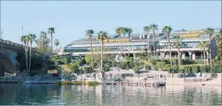  ?? Lake Havasu City CVB ?? SHUGRUE’S, a popular restaurant, overlooks the London Bridge. This month, the transplant­ed bridge marks 45 years in the Mojave Desert. Walking tours of the area are available.