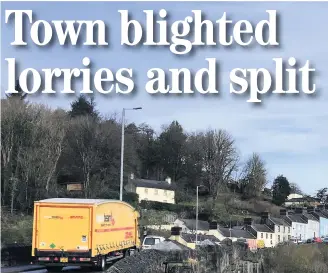  ??  ?? The A483 trunk road heading across the River Towy bridge into Llandeilo. Plans for a bypass have been in the pipeline for decades.