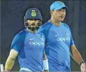  ??  ?? Men on mission: Team India’s captain Virat Kohli and head coach Ravi Shastri during a practice session