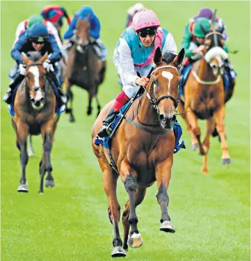  ??  ?? Dynamic duo: Frankie Dettori and Enable win the Irish Oaks at the Curragh in July