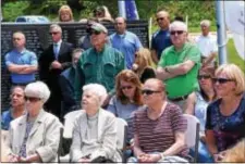  ?? ANNE NEBORAK – DIGITAL FIRST MEDIA ?? People gathered during the D-Day flag raising to commemorat­e those who served in World War II.