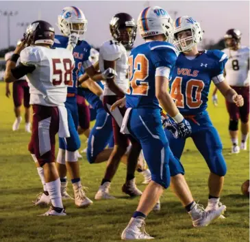  ?? (Photo by Logan Kirkland, SDN) ?? Starkville Academy seniors William Wolfe (22) and Noah Smith (40) celebrate a touchdown against East Webster earlier this season. Tonight Wolfe, Smith and 12 other seniors will be recognized for their contributi­ons to the Volunteers.