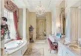  ?? SOTHEBY’S INT'L REALTY CANADA ?? A six-piece master ensuite is both stunning and serene, with gold accessorie­s, elaborate plasterwor­k and a garden-view soaker tub.