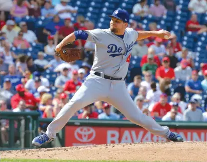  ??  ?? Lefty reliever Luis Avilan was 2- 3 with a 2.93 ERA last season for the Dodgers. He struck out 10.2 batters per nine innings. | GETTY IMAGES