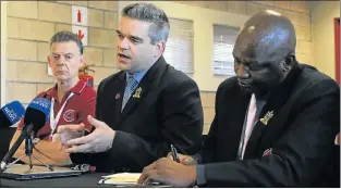  ?? Picture: RIAAN MARAIS ?? FINDING SOLUTIONS: DMISA executive member Dr Johan Minnie, centre, flanked by NMB disaster management senior manager Henry Lansdown and DMISA president Bafana Mazibuko, address a media briefing