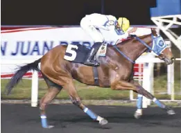  ??  ?? Patong Patong wins the Philracom 3YO Imported/Local Challenge Series’ second leg at the Metro Manila Turf Club in Malvar, Batangas last Sunday.