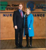  ?? Photo by Kaitlyn Rigdon/News-Times ?? Alliance: MCSA CEO Scott Street stands next to Arkansas Children’s Hospital President and CEO Marcy Doderer after the unveiling of the women’s center’s new sign. MCSA joined the Arkansas Children’s Hospital Nursery Alliance Thursday.