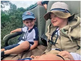  ??  ?? ABOVE: Jacques and cousin Raigen (son of Charlene’s younger brother Sean) thoroughly enjoyed their time on safari. RIGHT: Charlene – in a chic safari jumpsuit – is a hands-on mom who isn’t afraid to carry her kids around. BOTTOM: Gabriella, who’s more outspoken than her brother, greets the traditiona­l Zulu dancers.