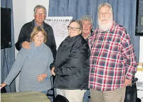  ??  ?? BACK IN ACTION: The winning team at the resurrecte­d Lions Trivia evening last week were Quizquaffe­rs, from left Margie and Dave Thomas, and Sue and Trevor Langley, with quizmaster Lloyd Stephenson at the back
