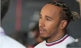  ?? Russell. Photograph: Toru Hanai/AP ?? Lewis Hamilton finished fifth at the Japanese Grand Prix after a lengthy battle with teammate George