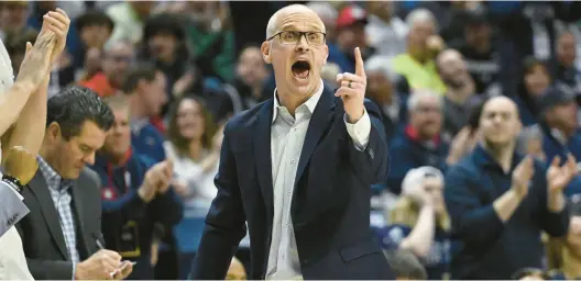  ?? JESSICA HILL/AP PHOTOS ?? Long the hunter, Dan Hurley and defending champion Uconn are now the hunted.